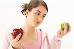 Girl Holding Apples