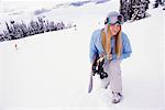 Woman Carrying Snowboard
