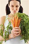 Woman Holding Carrots
