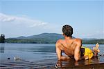 Man Relaxing on Dock