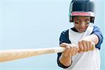 Boy swinging baseball bat