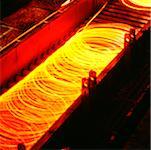 High angle view of red hot coils of steel wire, Illinois, USA