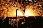 Hot saw cutting steel beams, Illinois, USA