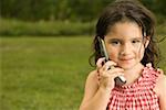 Portrait of a girl talking on a mobile phone