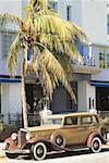 Vintage car parked in front of a hotel, Miami, Florida, USA