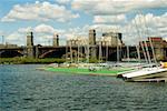 Sail boats anchored in the river near an arch bridge, Boston, Massachusetts, USA