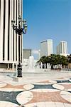 Lamppost and fountain in front of a building, New Orleans, Louisiana, USA