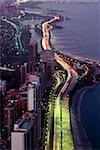 Aerial view of buildings along a highway in a city, Lake Michigan, Chicago, USA