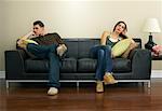 Couple Sitting on Couch