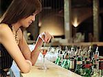 Woman Sitting at Bar