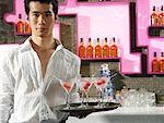 Waiter Holding Tray of Martinis