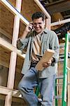 Carpenter Talking on Cell Phone