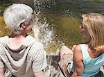 Couple Sitting on Dock