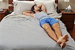 Man Lying on Bed