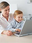 Mother and Son with Laptop Computer