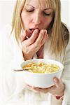 Woman Eating Chicken Noodle Soup