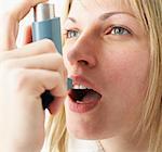 Woman Using Inhaler
