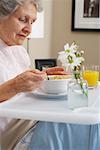 Woman Eating Soup