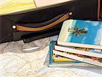Suitcase, Maps and Travel Books