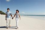 Couple Walking on Beach