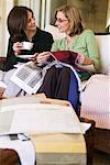 Women Looking at Fabric Swatches