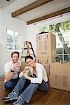 Couple with Boxes In A New House