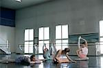 Young woman doing ballet exercises