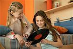 Two friends choosing records