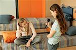 Girl listening to singing friend