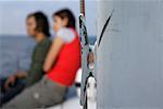 Couple on a sailboat