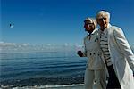 Two mature women walking along the Baltic Sea