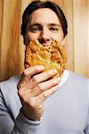 Man Holding Cookie