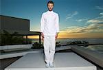 Portrait of Man Standing on Patio at Sunset