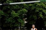 Male High Jumper Sizing Up the Bar