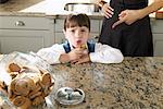 Girl Taking Cookie from Jar