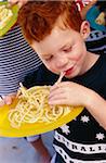 Boy Eating Pasta