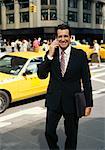 Businessman outdoors, Talking On Cellular Phone