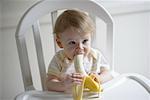 Baby Girl Eating Banana