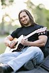 Portrait of Man With Guitar