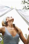 Woman Hanging Laundry on Clothesline