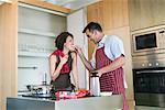 Couple Cooking in Kitchen