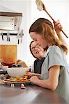 Brother and Sister in Kitchen