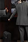 Businessman at Hotel Desk