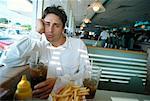 Portrait of Man in Diner