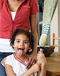 Mother and Daughter with Broom