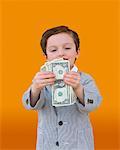 Boy Playing with Money