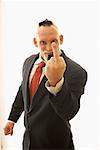 Businessman Giving Middle Finger