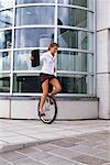 Businesswoman on Unicycle