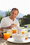 Man Drinking Coffee Outdoors