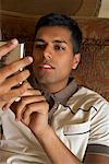 Man Using Cellular Telephone